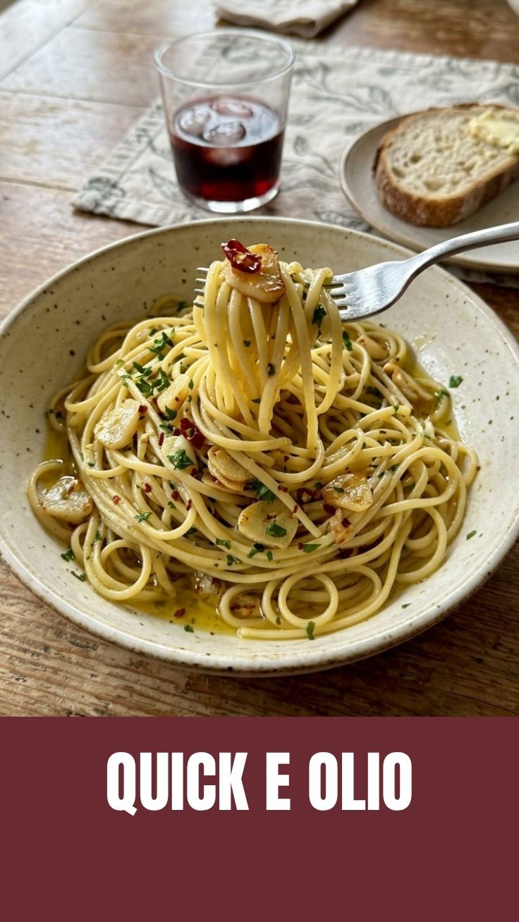 A close-up of freshly prepared Aglio e Olio pasta garnished with parsley