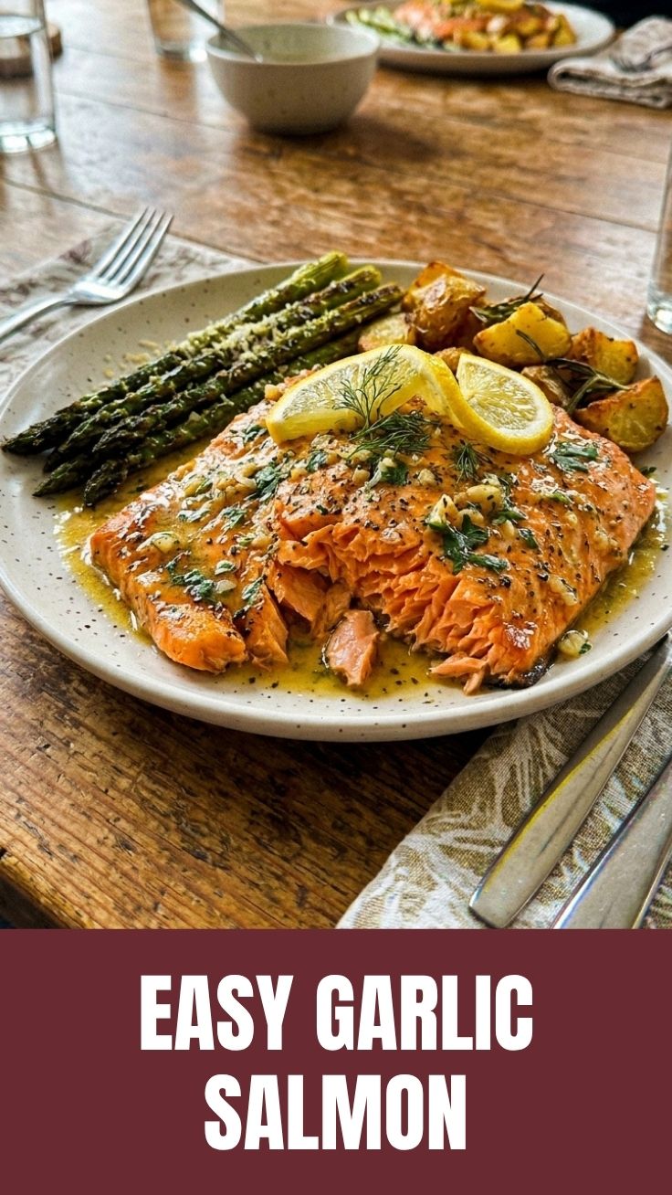 A perfectly cooked Lemon Garlic Salmon fillet with herbs.
