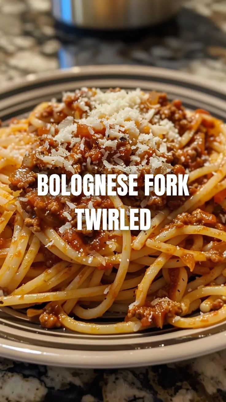 A steaming plate of spaghetti bolognese topped with fresh basil.