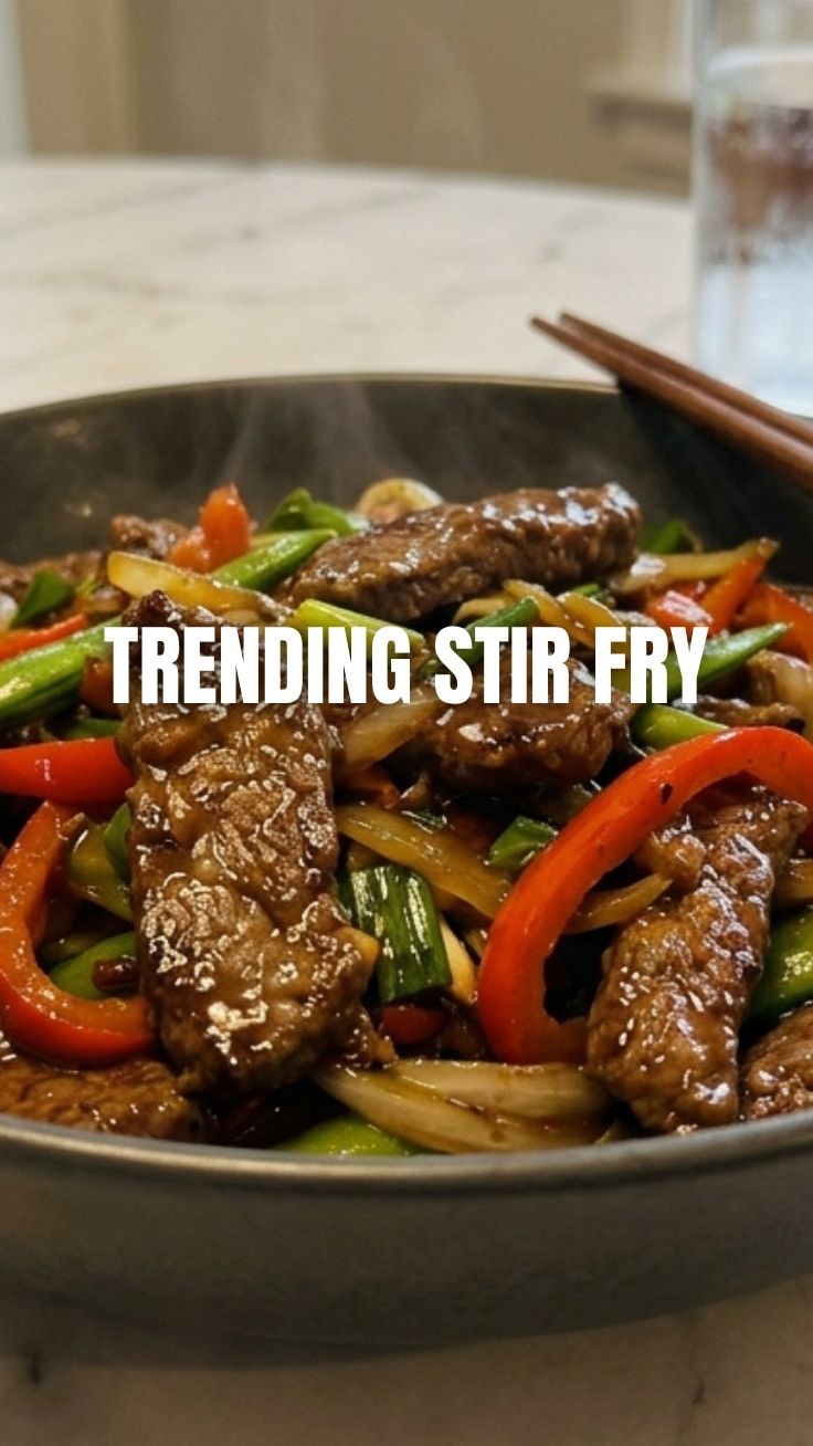 Beef stir fry with vibrant vegetables in a wok