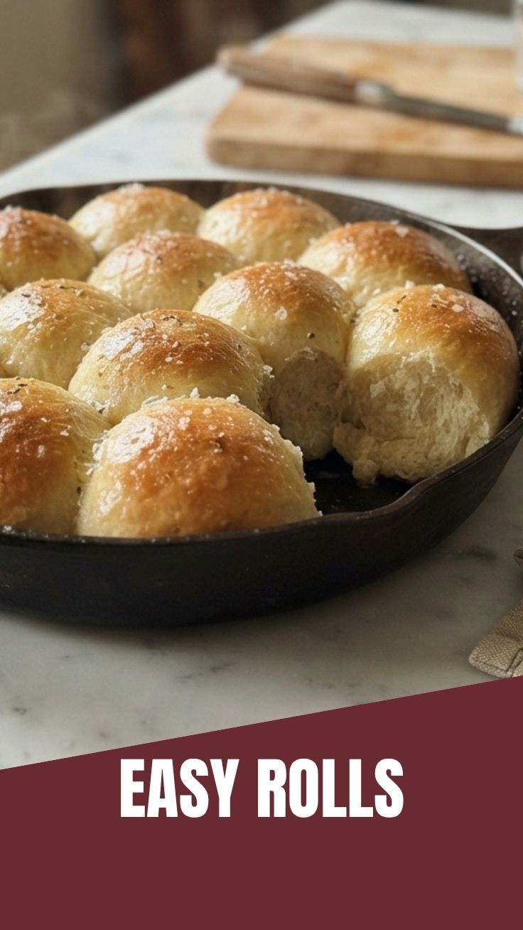 Freshly baked golden brown dinner rolls in a basket