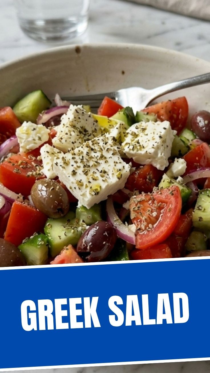 A fresh Greek salad with colorful vegetables and feta cheese