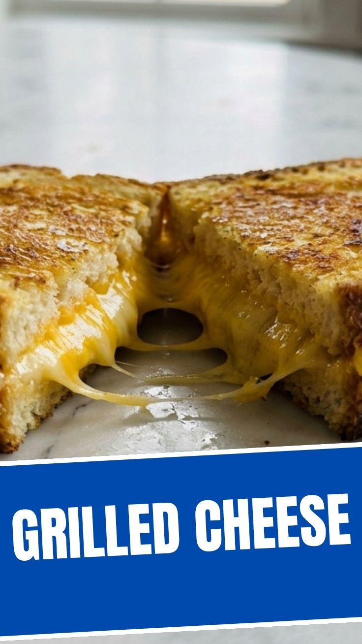 A perfectly golden brown grilled cheese sandwich, still warm and inviting.