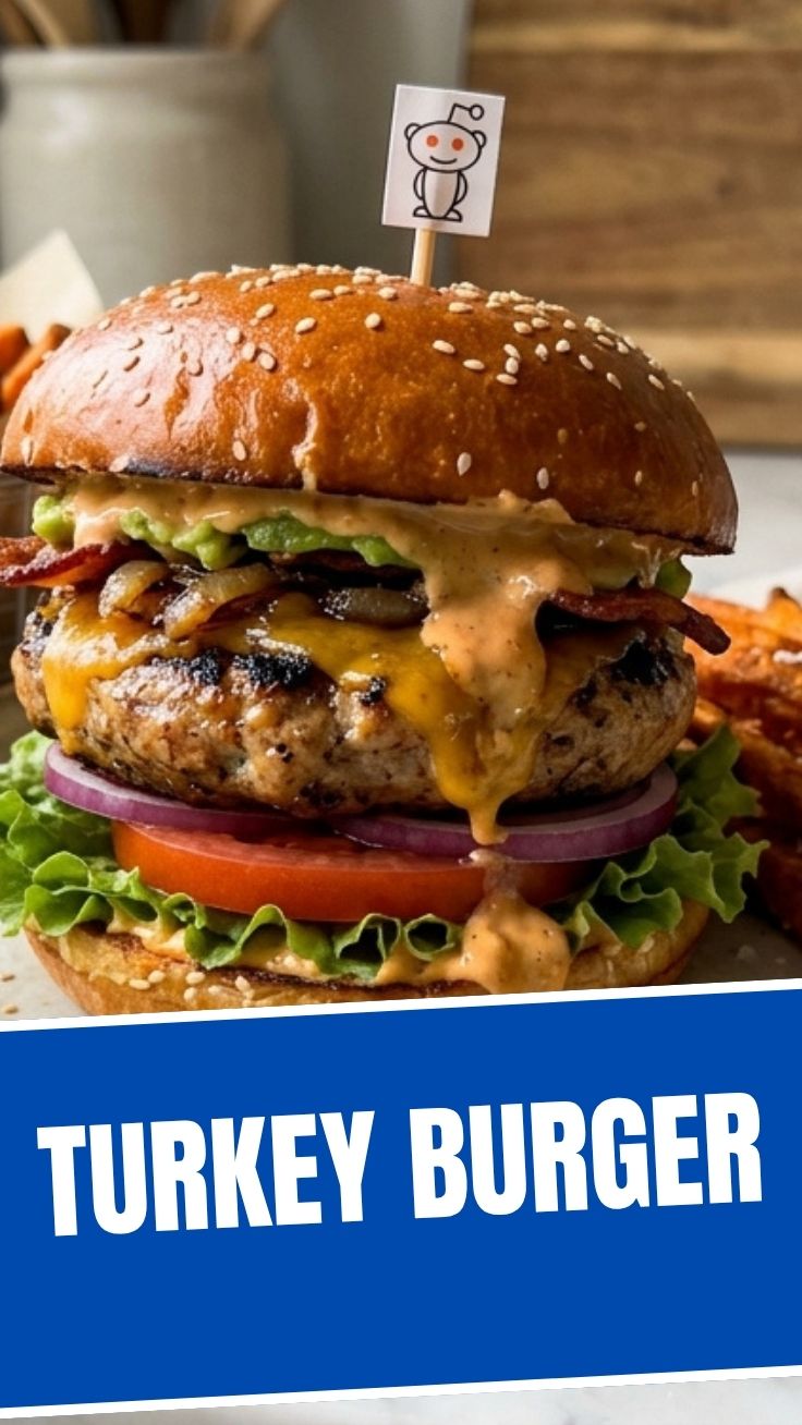 A perfectly grilled turkey burger served on a toasted bun with fresh toppings.